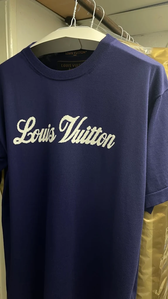 High-end blue knit garment at Perfecta Cleaners