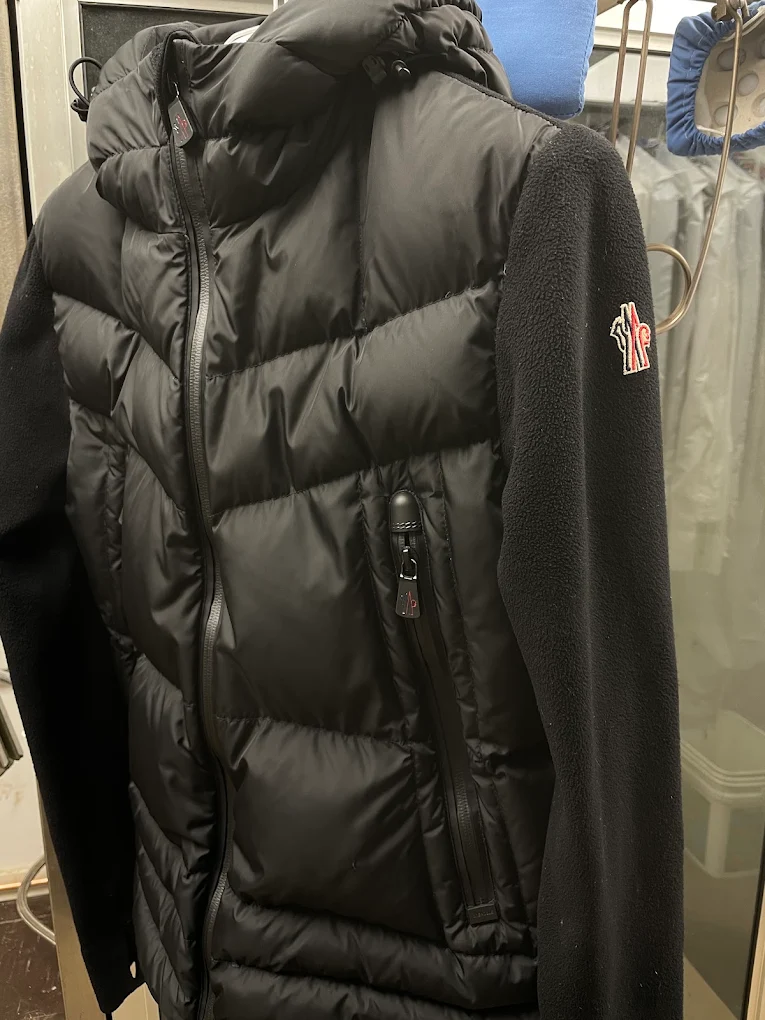 Premium black puffer jacket cared for by Perfecta Cleaners