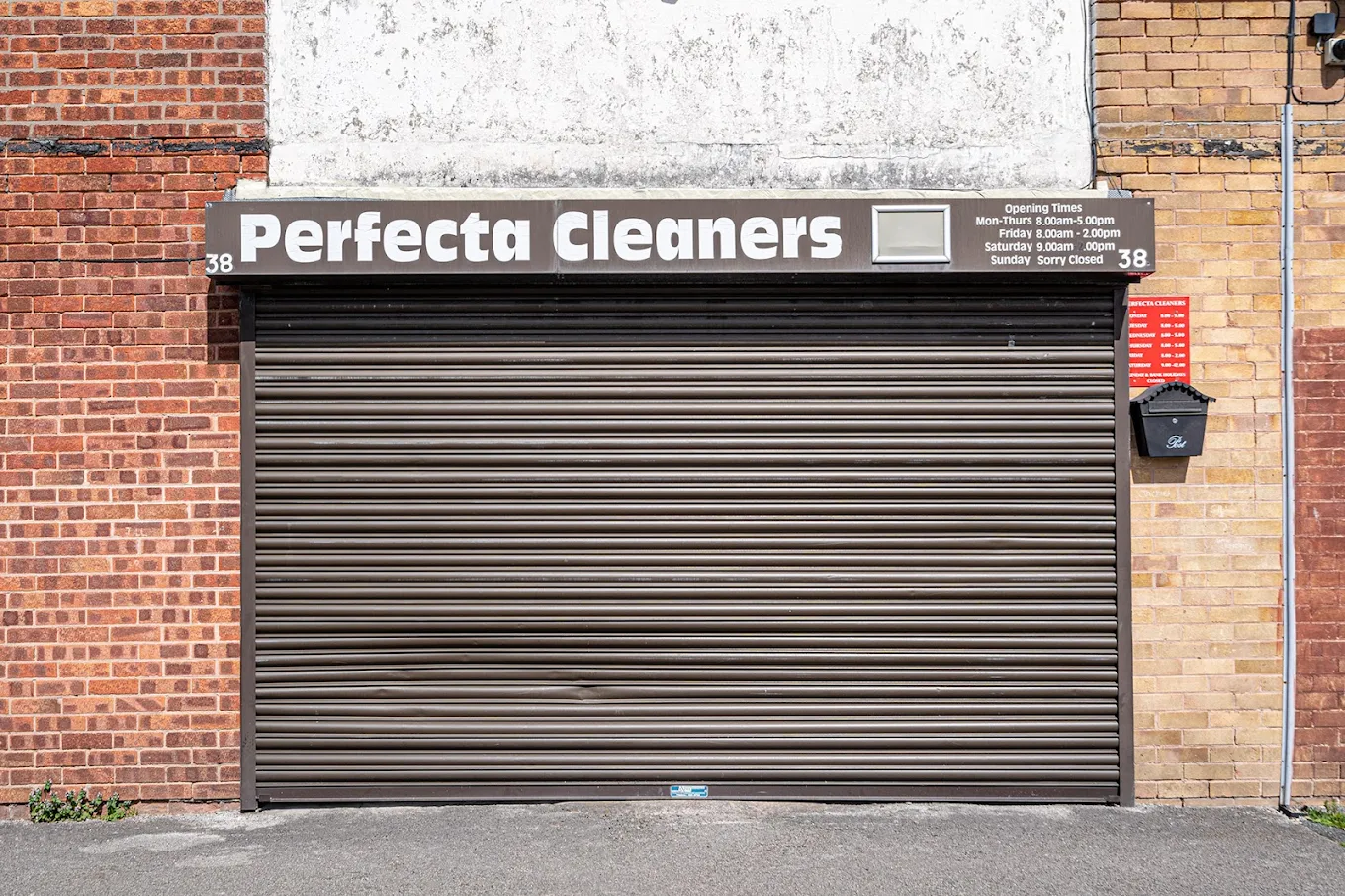 Perfecta Cleaners shop exterior at 38 Carr Lane in Wigan